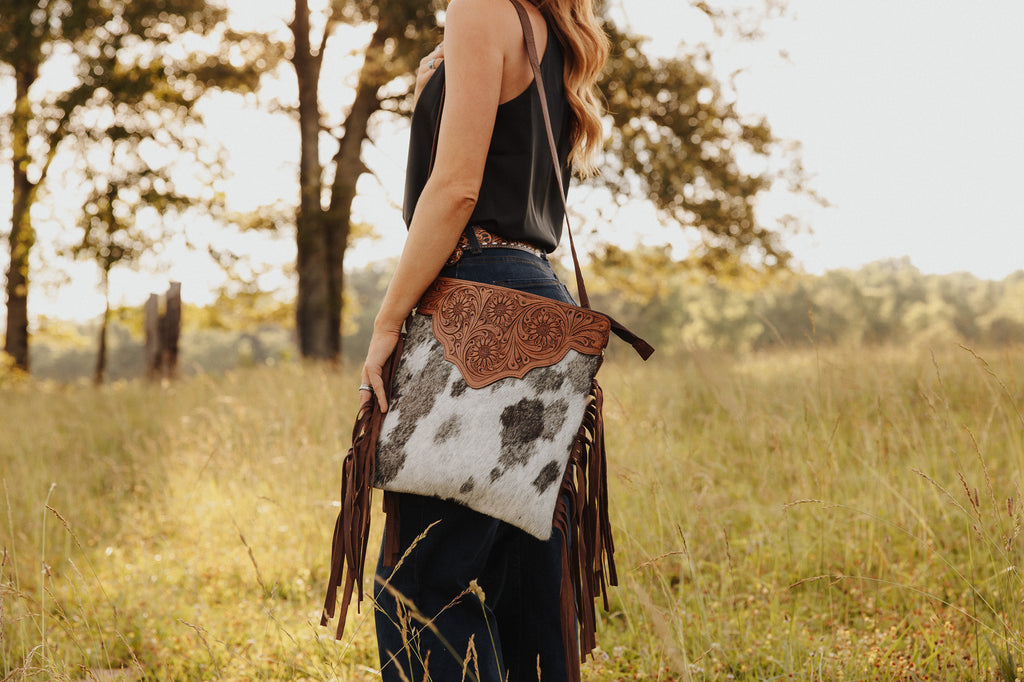 Cowhide fringe crossbody deals